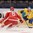 MINSK, BELARUS - MAY 10: Sweden's Joakim Lindstrom #12 pulls the puck away from Denmark's Stefan Lassen #6 during preliminary round action at the 2014 IIHF Ice Hockey World Championship. (Photo by Richard Wolowicz/HHOF-IIHF Images)

